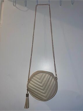 Women's Cream Quilted Round Crossbody Bag with Tassel